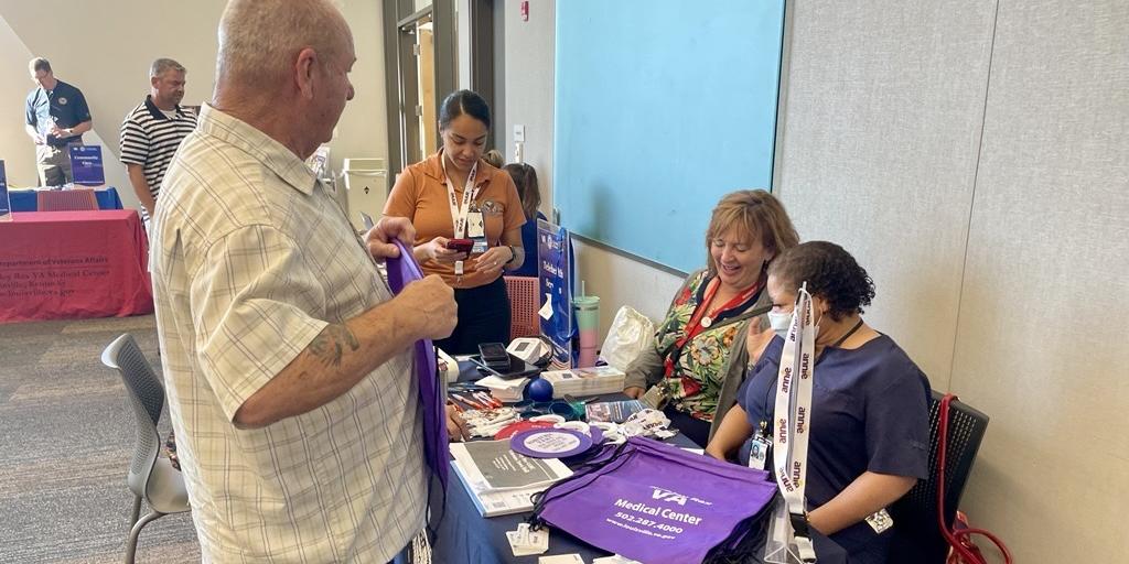 Veteran speaks with staff from Robley Rex VA Medical Center.