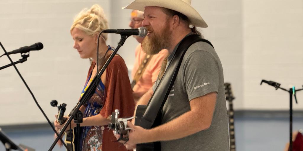 Adam and Cherish Hamby of the Dark Waters Project perform for inpatient Veteran