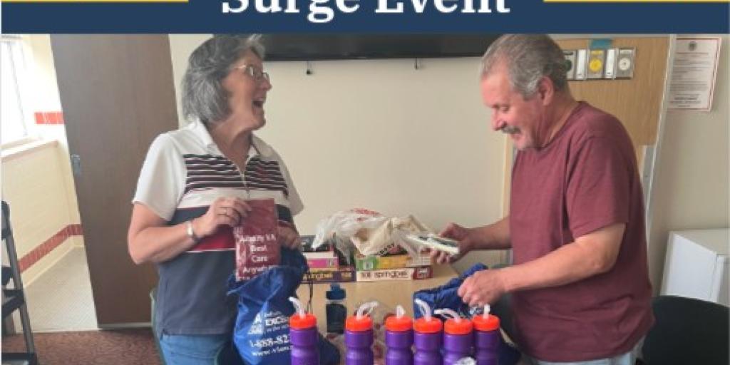 Stratton VA Volunteers packing go Bags to hand out during the HHCHV Summer Surge event July 15-17