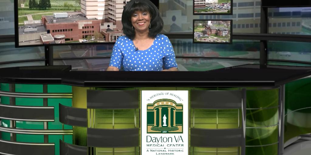 Rhonda Moore, Public Affairs Officer, at desk