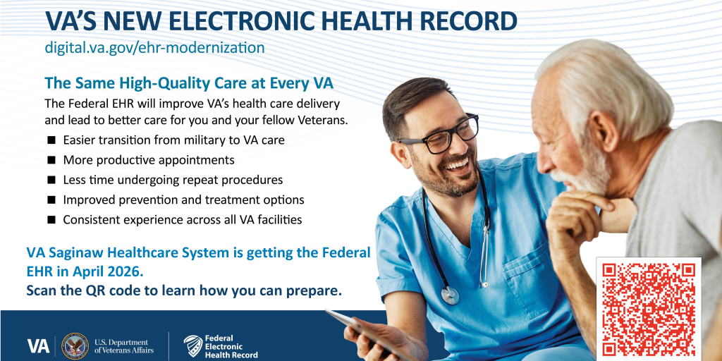 A male care provider in blue scrubs in a discussion with an elderly man.