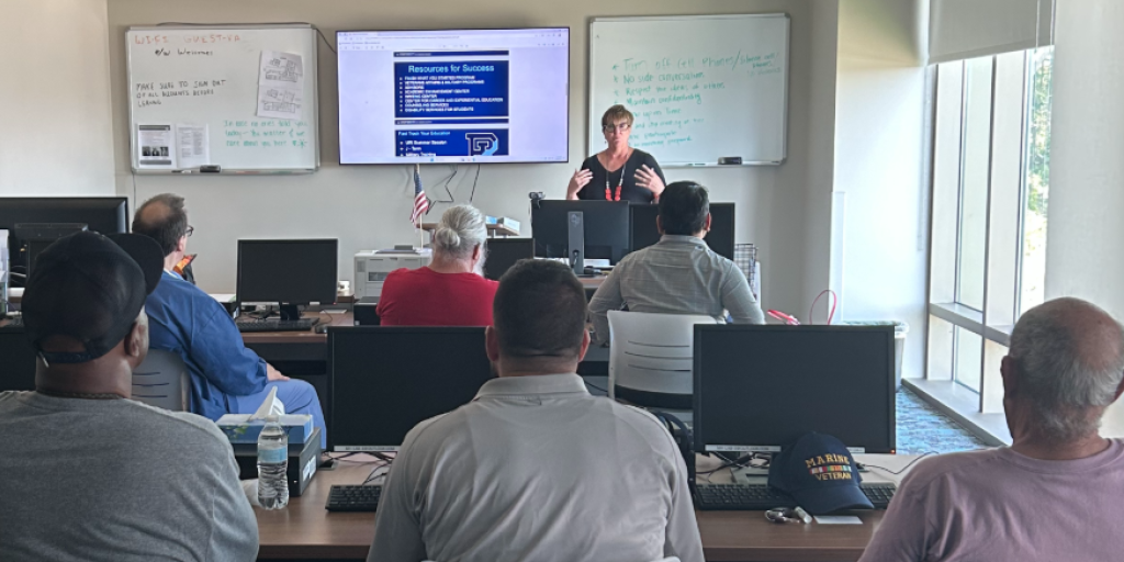 University of Rhode Island's Nancy Robidoux presents to potential student Veterans.