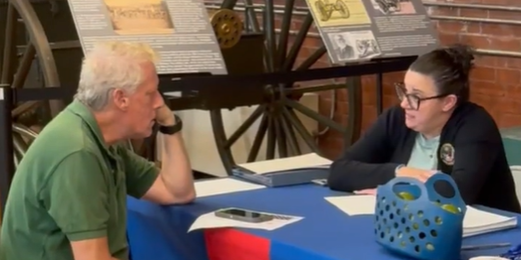 VA Providence's Michelle Henderson speaks to a Veteran about enrolling in VA Healthcare.