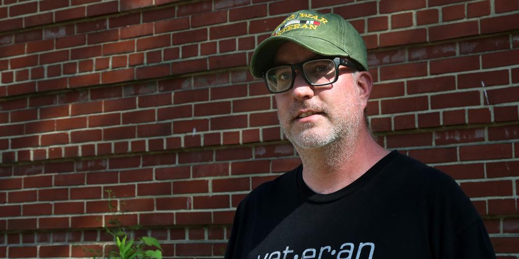 Veteran stands outside Building 39 during a visit to the Coatesville VA Medical Center.