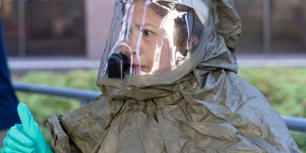 An emergency medical response team member signals they are ready to start training.