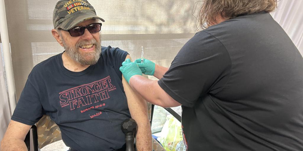 Navy Veteran Edward Covington of Big Spring, Texas, receives his flu shot during the annual flu vaccination campaign on Sept. 22.