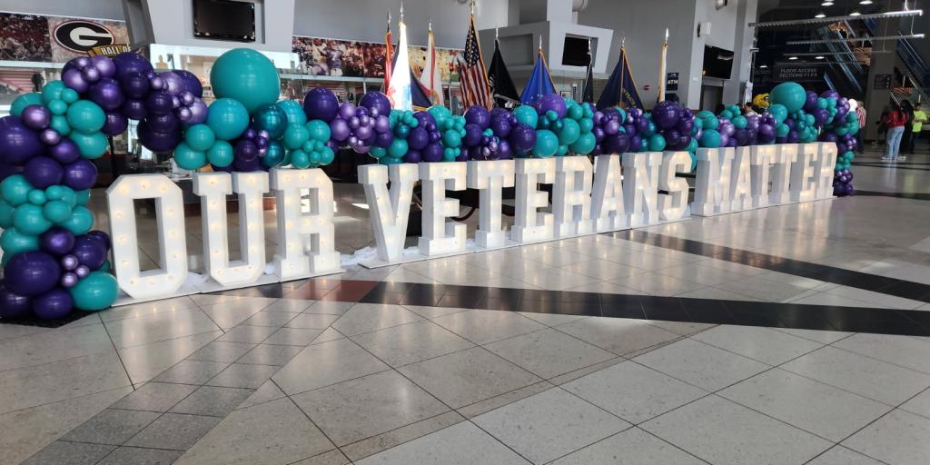 Our Veterans Matter, front and center as Veterans entered the stadium for the event.