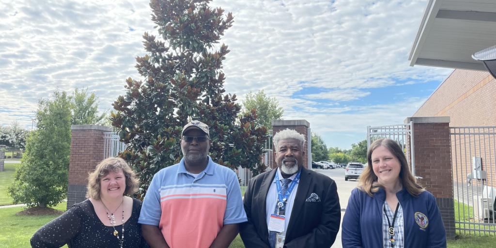 U.S. Air Force Veteran Andre Long poses for a portrait with his VA care team at the Kernersville VA Health Care Center in Kernersville, NC.
