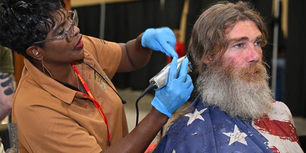 Veteran getting haircut at annual Stand Down. 