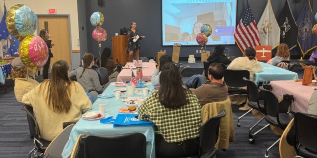 VA Providence's Joanne Barrett speaks to expecting families during the baby shower.