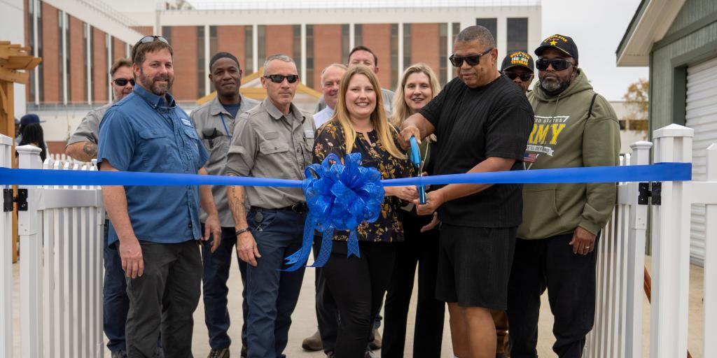 Columbia VAHCS employees and Veterans cut the ribbon to celebrate the grand opening of Columbia VAHCS Whole Health Garden.