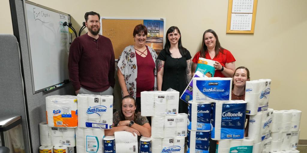 Sioux Falls VA staff with toilet paper donations