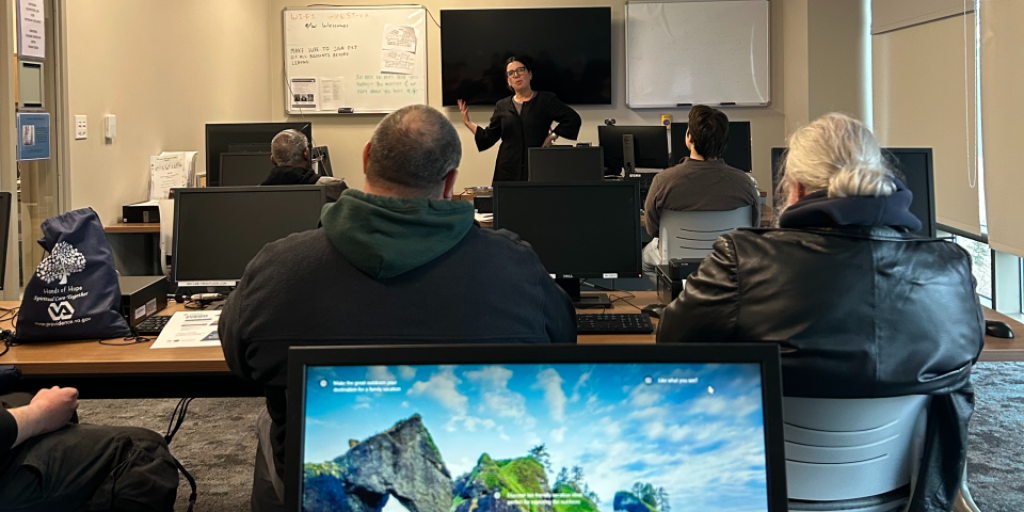 Coworx staff inform Veterans about job opportunities offered through their company.