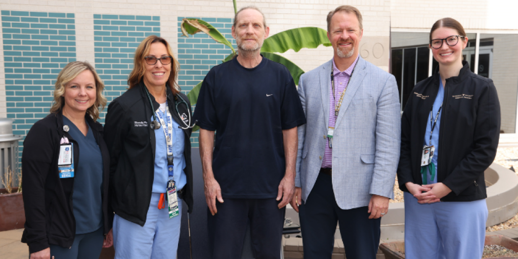 58-year-old Army Veteran Jeffrey Duke with his care team
