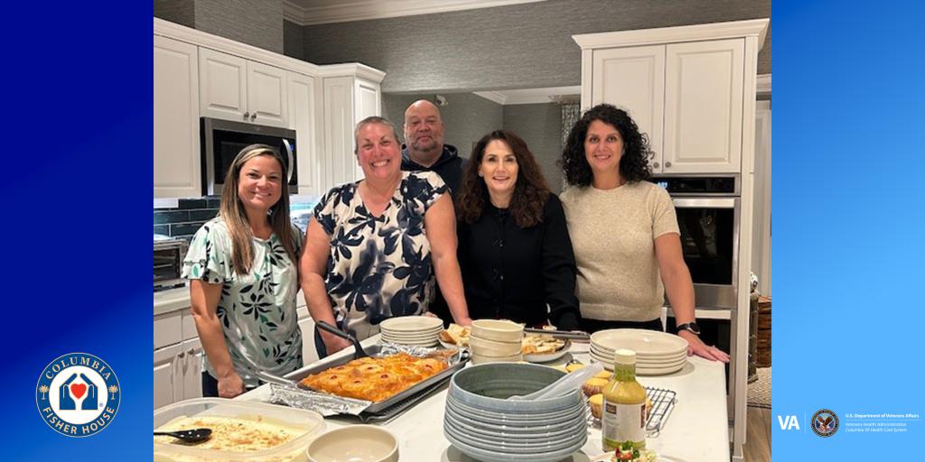 Volunteers from QM pose in the kitchen of the Columbia VA Fisher House. 