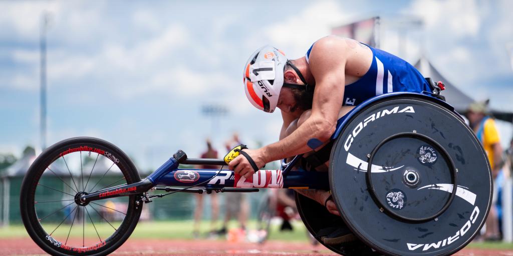 Air Force Veteran Auston Duncan competes in a wheelchair racing event during the 2024 Department of Defense Warrior Games in Orlando, Florida.
