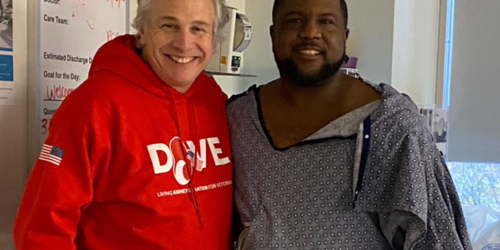 Steve, left, visiting Kevin in the hospital after Kevin's transplant surgery.