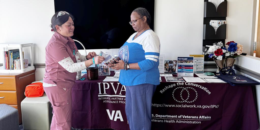 Bernadine Bustamante (left), women’s health registered nurse, assists Navy Veteran Paula Gotlibowski (right) at the specialized resource table during the Ventura VA Papathon.