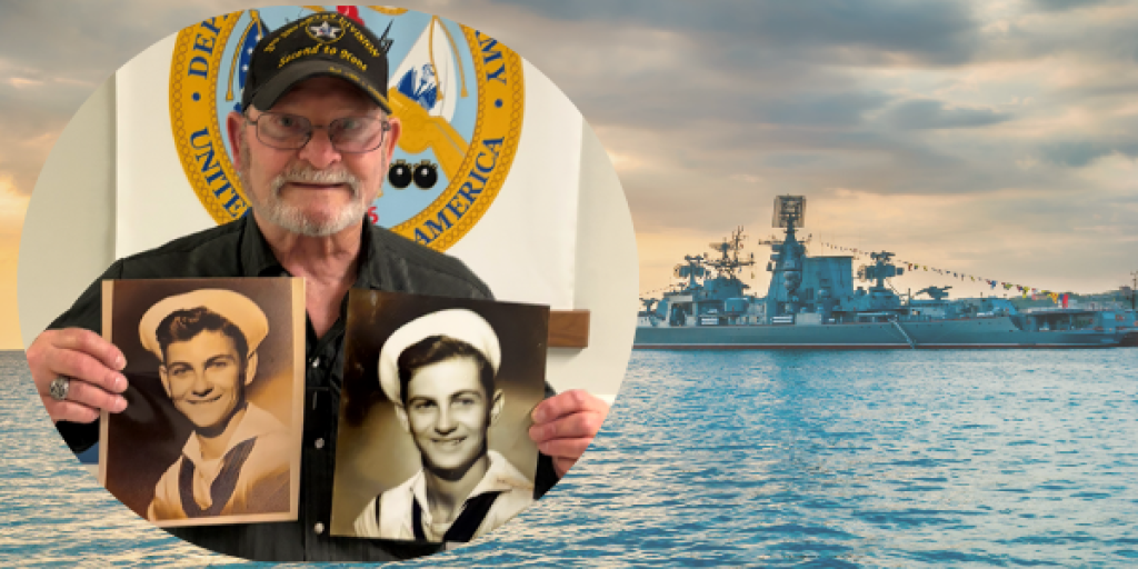 Older man in navy cap holding two photos of men in sailor uniforms.