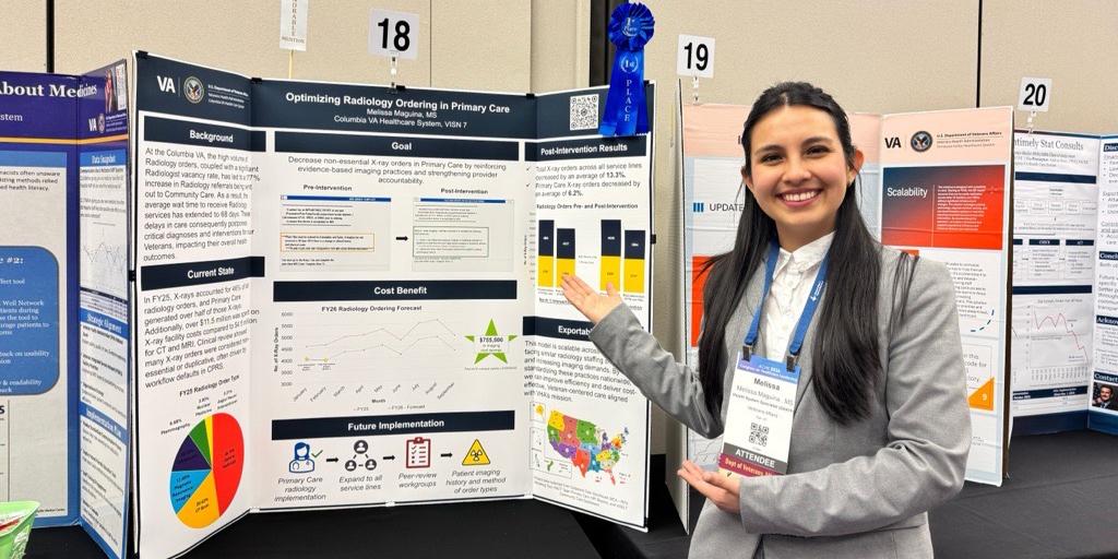 Melissa Maguina, a Columbia VA Health Care System Graduate Healthcare Administration Fellow, poses with her first place presentation. 