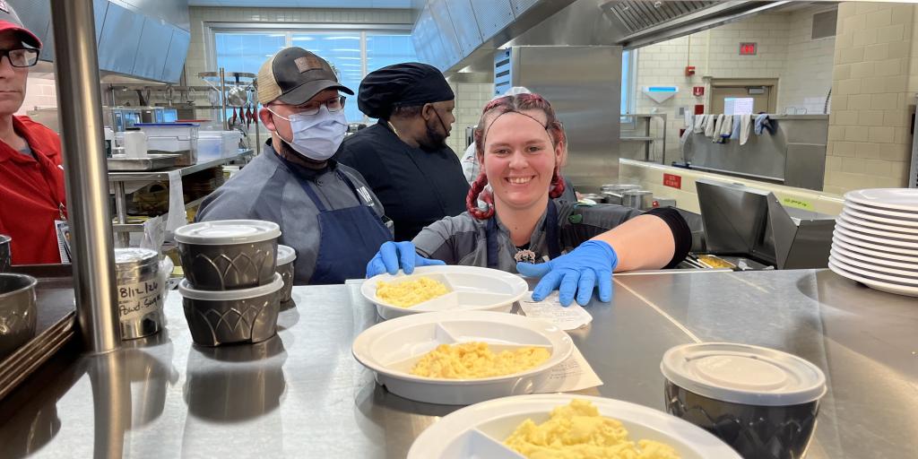 Kitchen staff preparing meals.