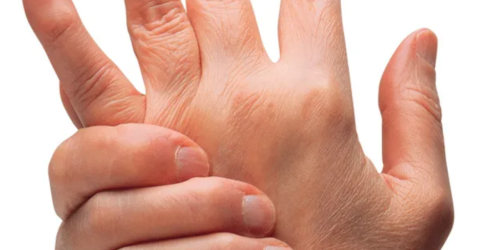 Two hands holding each other, one hand gripping the other's wrist.