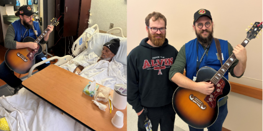 Two men with guitars visit a patient in a hospital bed.