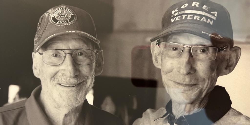 Korean War Veteran, Dr. Irwin Berman smiling with his twin brother. 