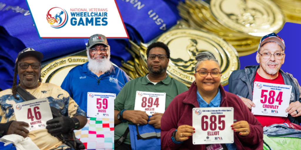 Six wheelchair racers hold their bib numbers with medals and banners behind them.