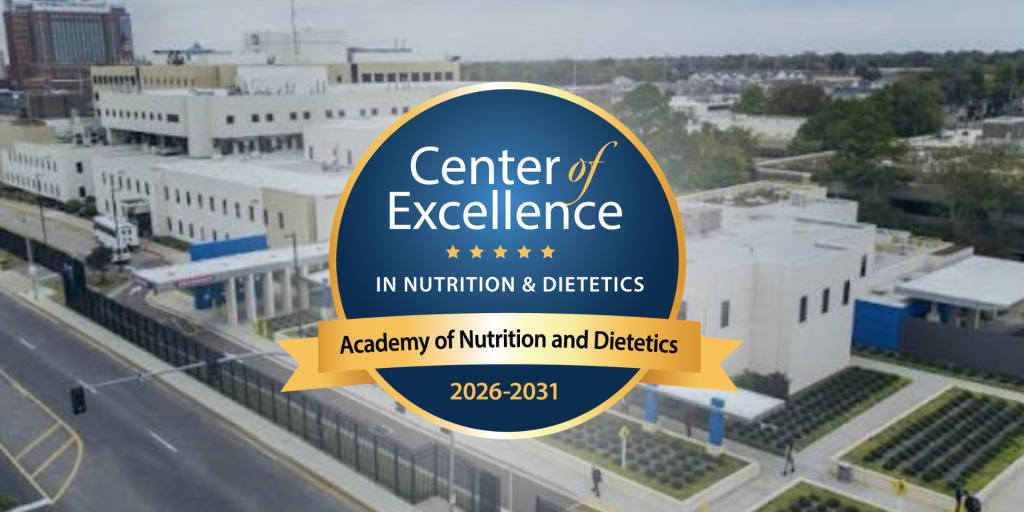 Center of Excellence logo with campus view, denoting academic and medical excellence.