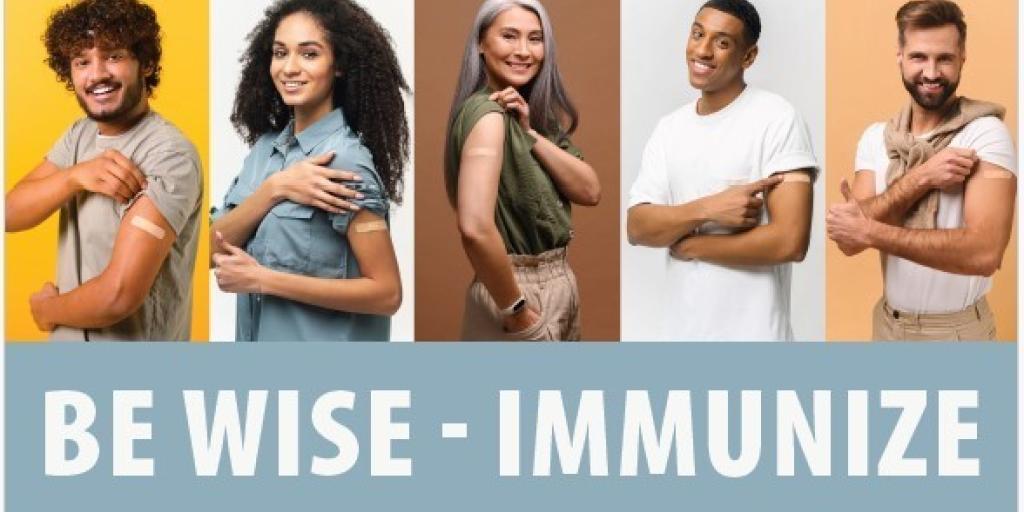 Five people with different hair colors posing for a photo with "Be Wise - Immunize" text.