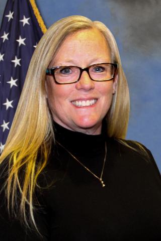 blonde woman with glasses