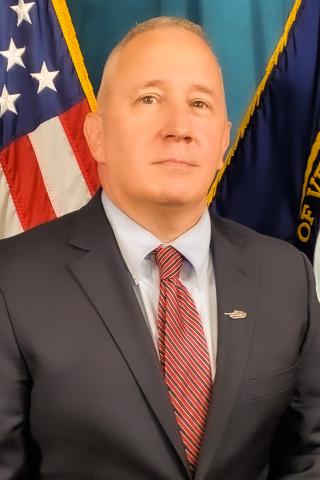 Scott Reesman, Acting Director