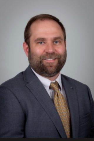man in suit smiling