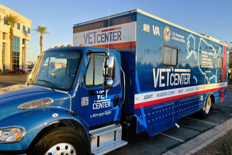 Mobile Vet Center (in blue vehicle wrap).  This vehicle is a mobile service resource that provides services in various areas in the capacity of outreach support, resource connection and referral services for  all elements of the Armed Forces, Veterans, and Families that desire assistance.