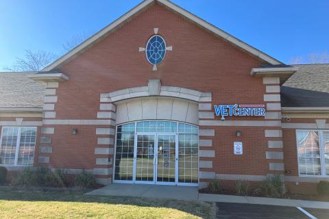  Building with brick and stone façade. Vet Center sign 