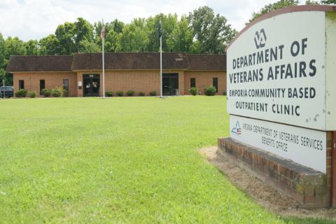 Front of Emporia Community Based Outpatient Clinic building with Department of veterans Affairs sign in the foreground.