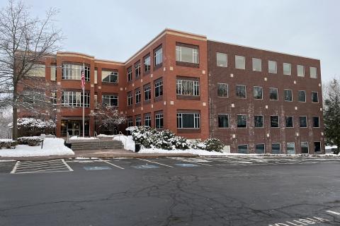 main entrance of office building at 707 Sable Oaks Drive in South Portland Maine