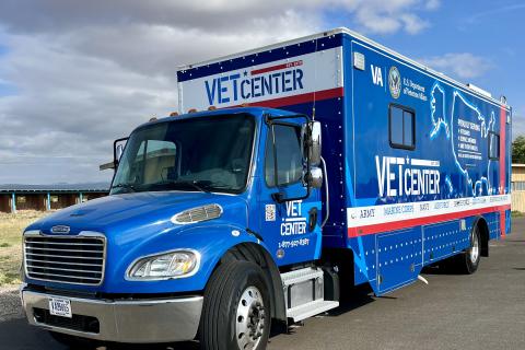 Mobile Vet Center shown from driver's side front and extends to the side to show the Vet Center logos