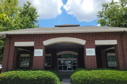 Red Brick building with 2 Lancaster County Veteran Service office signs
