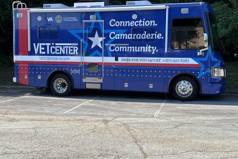 Blue RV with Vet Center logo and wrap