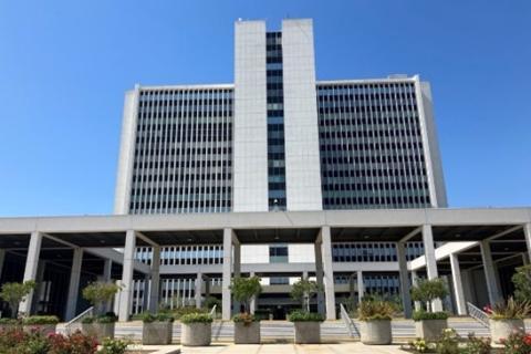 Tall white building at the corner of Wilshire and Sepulveda Boulevards
