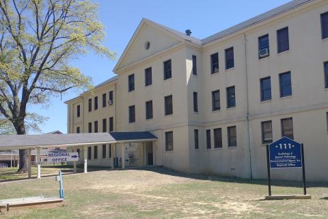 Building 111 is a white, three story building.  Enter the building using the north, south or east entrances. The Regional Office is on the 1st floor.