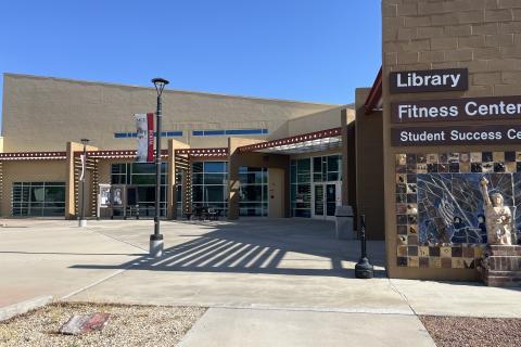 Tan Brick Building that houses Library and Student Success Center.