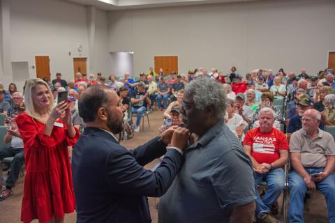 Vietnam-Era Veteran receives lapel pin in ceremony honoring the 50-year anniversary of the Vietnam War.