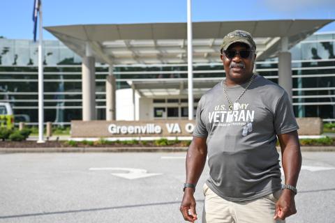 Donald Arthur poses outside the Greenville VA Outpatient Clinic.