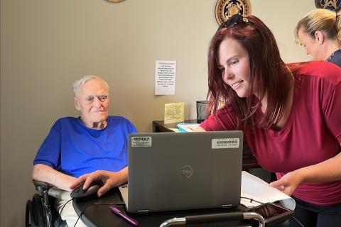 A Veteran gets his photo taken for a new VHIC.