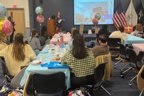 VA Providence's Joanne Barrett speaks to expecting families during the baby shower.