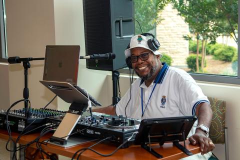 “DJ Ash”, Troy Ash's alter ego, entertains Veterans and staff at VA hosted events, including Vet Fest, to bring joy to those around. 
