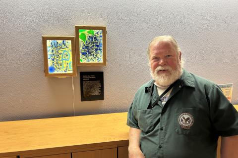 David Olsen, Maintenance Mechanic and master carpenter with the VA’s Vancouver campus, shows off two shadow boxes he recently created